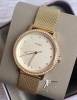 ساعت زنانه با بند طلایی فسیل 
